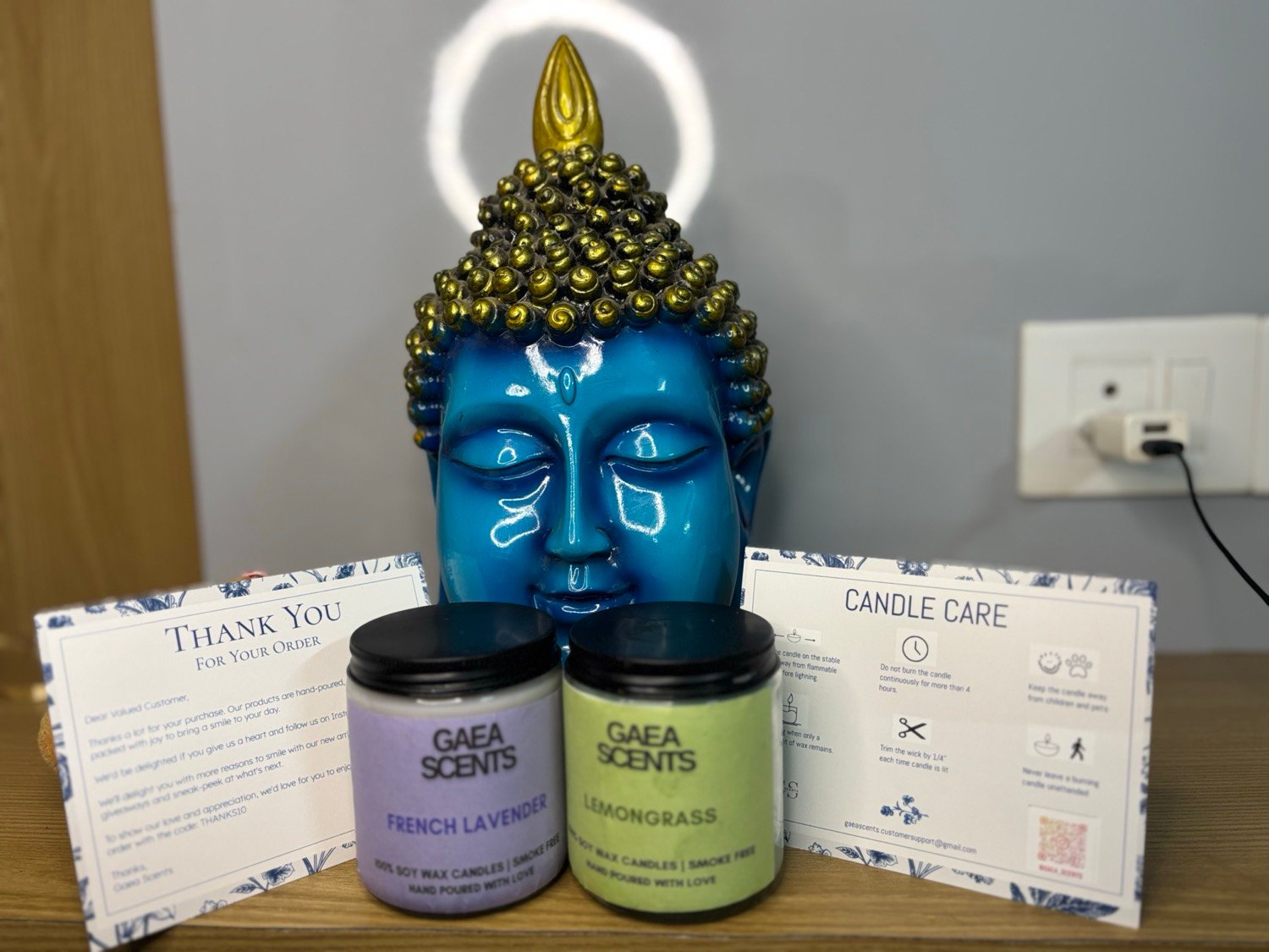 Gaea Scents hand-poured soy candles with a handwritten thank-you card